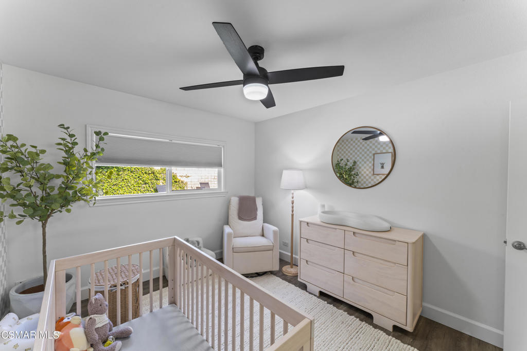 3585 Woodhaven Street Simi Valley, CA 93063 - Photo 21 of 33 a living room with furniture and a window