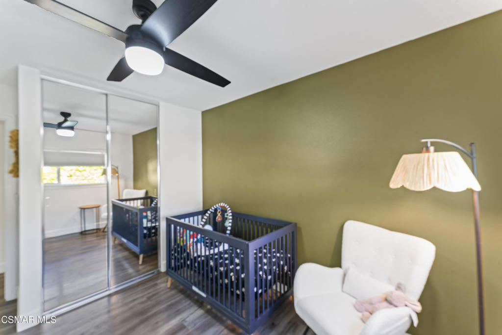 3585 Woodhaven Street Simi Valley, CA 93063 - Photo 23 of 33 a bedroom with furniture and a window