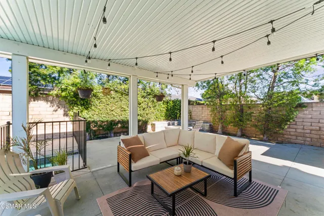 a outdoor living space with furniture and garden view
