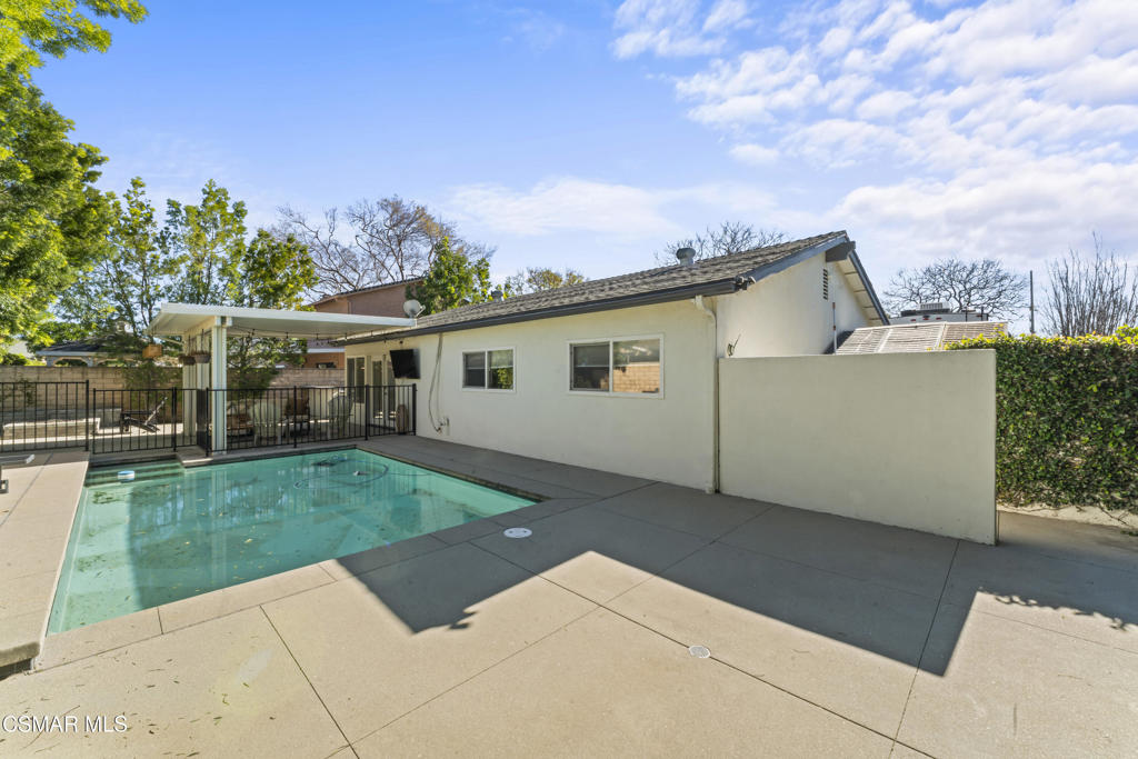 3585 Woodhaven Street Simi Valley, CA 93063 - Photo 29 of 33 a view of a house with a backyard