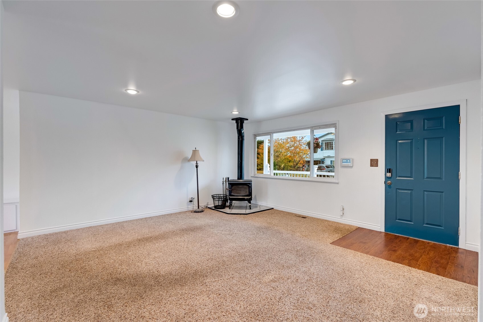 12649 Southeast 169th Place Renton, WA 98058 - Photo 12 of 38 wooden floor in an empty room with a window