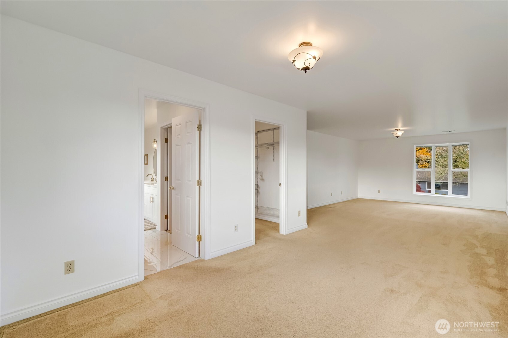 12649 Southeast 169th Place Renton, WA 98058 - Photo 20 of 38 a view of an empty room with a window