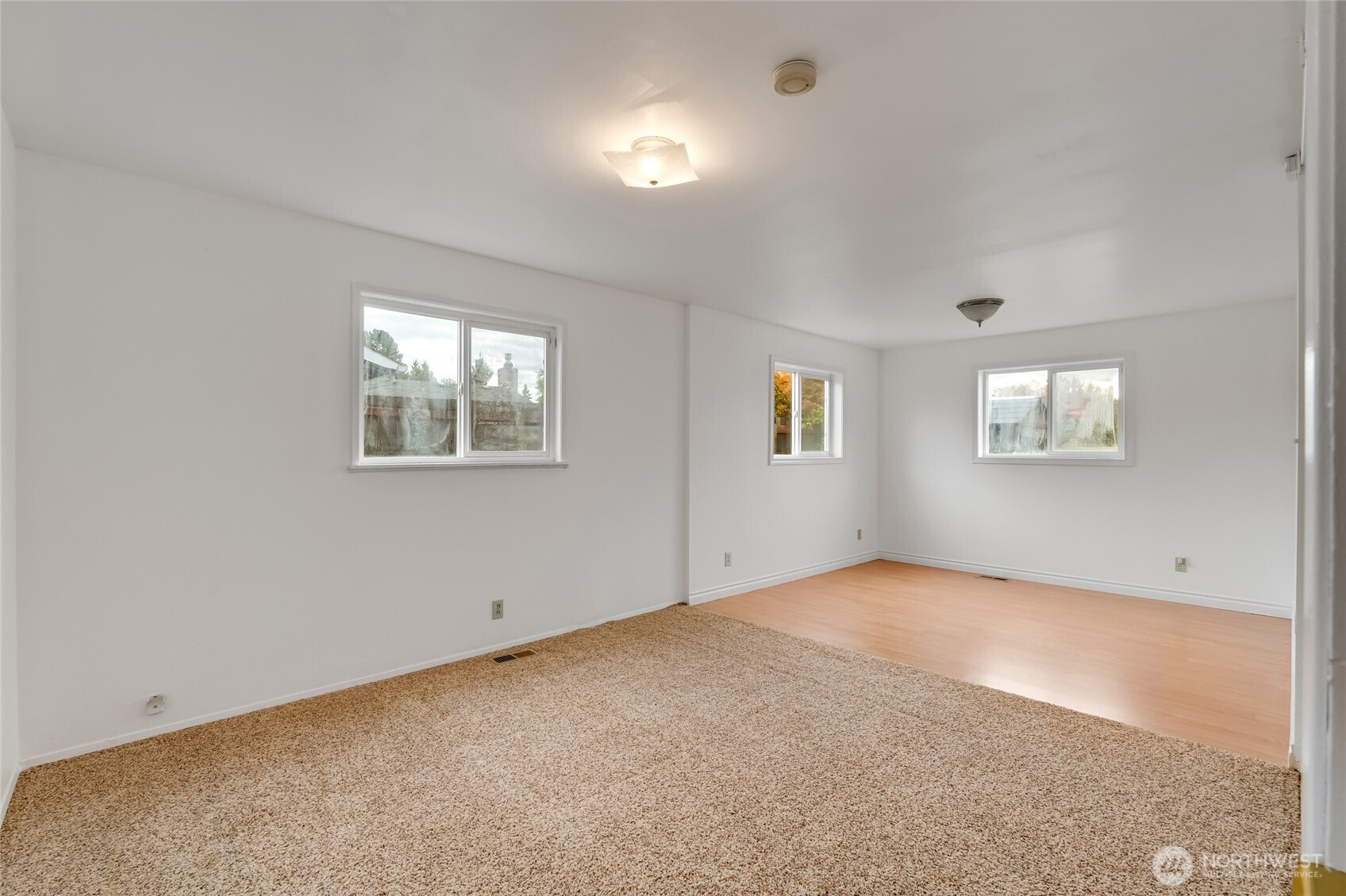 12649 Southeast 169th Place Renton, WA 98058 - Photo 28 of 38 an empty room with windows
