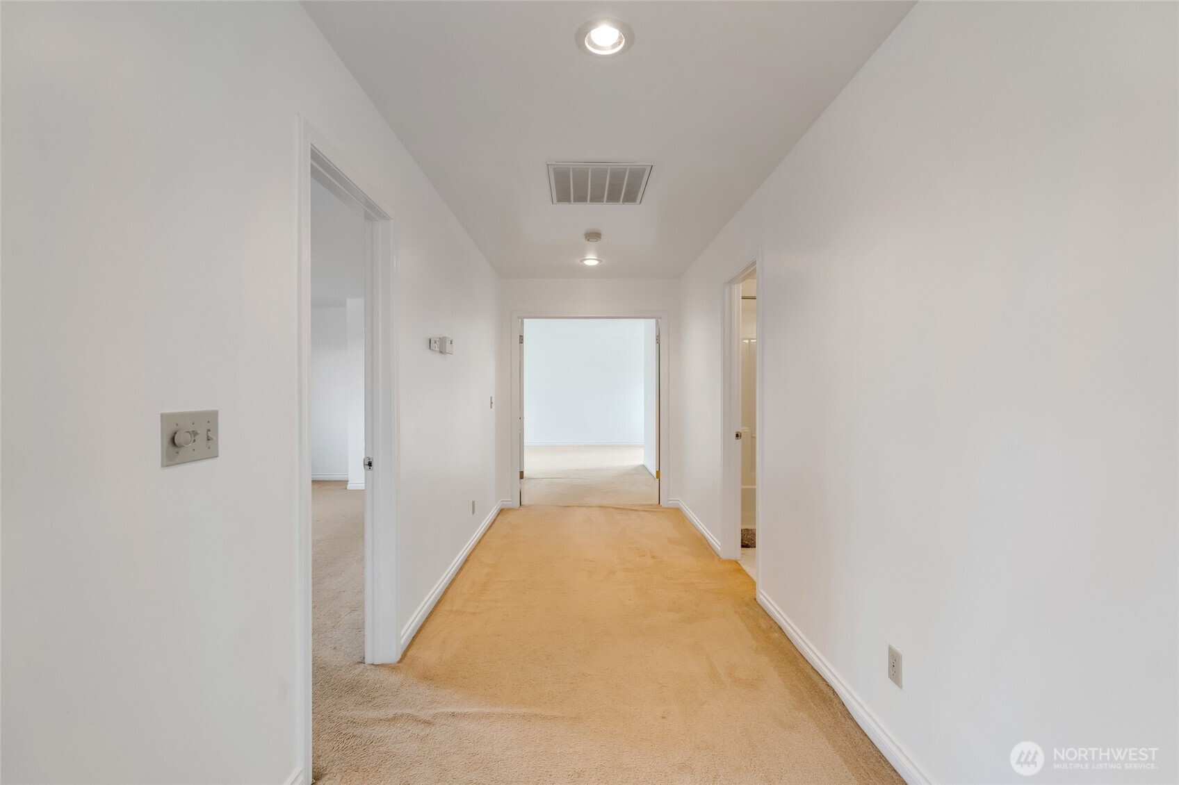 12649 Southeast 169th Place Renton, WA 98058 - Photo 31 of 38 a view of a hallway with a white walls