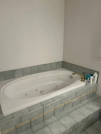 a view of a bathtub in a bathroom