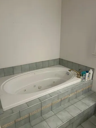 a view of a bathtub in a bathroom