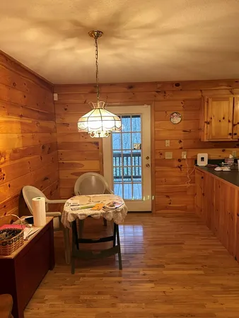 a kitchen with cabinets a sink and appliances