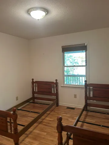 a room with storage and windows