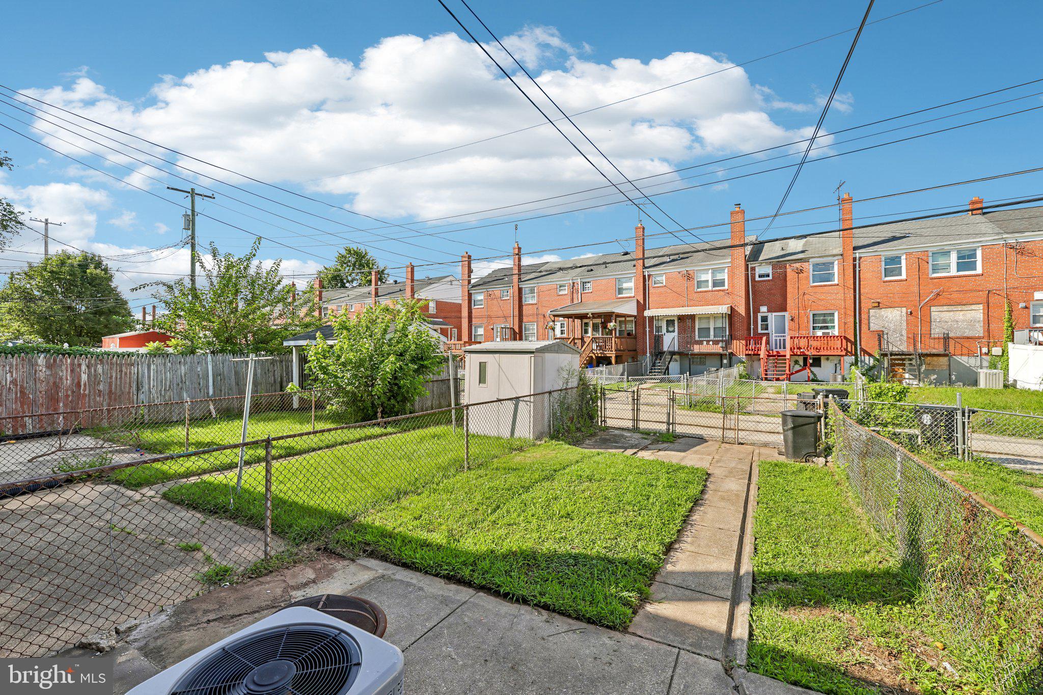 335 Torner Road Baltimore, MD 21221 - Photo 19 of 25 Charming backyard with lush greenery.