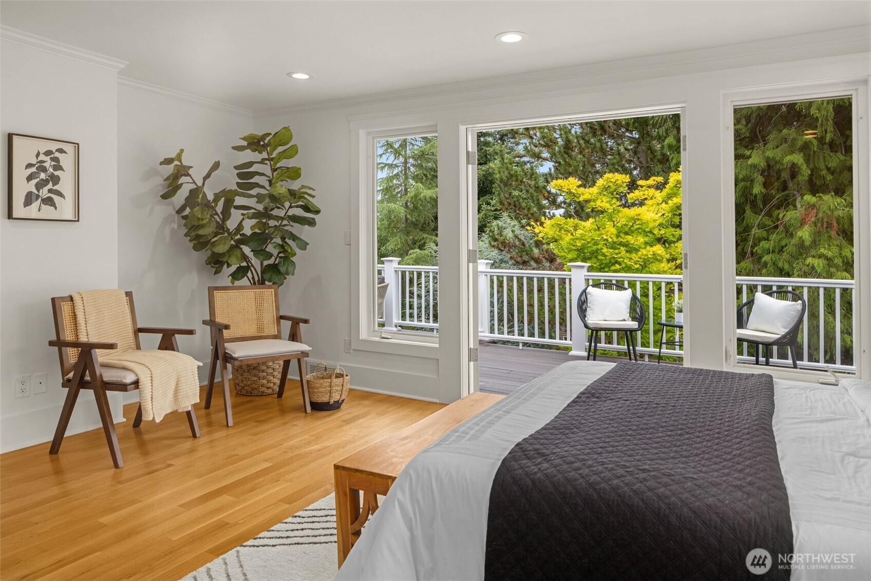 3204 Evergreen Point Road Medina, WA 98039 - Photo 21 of 39 a spacious bedroom with a bed and a large window