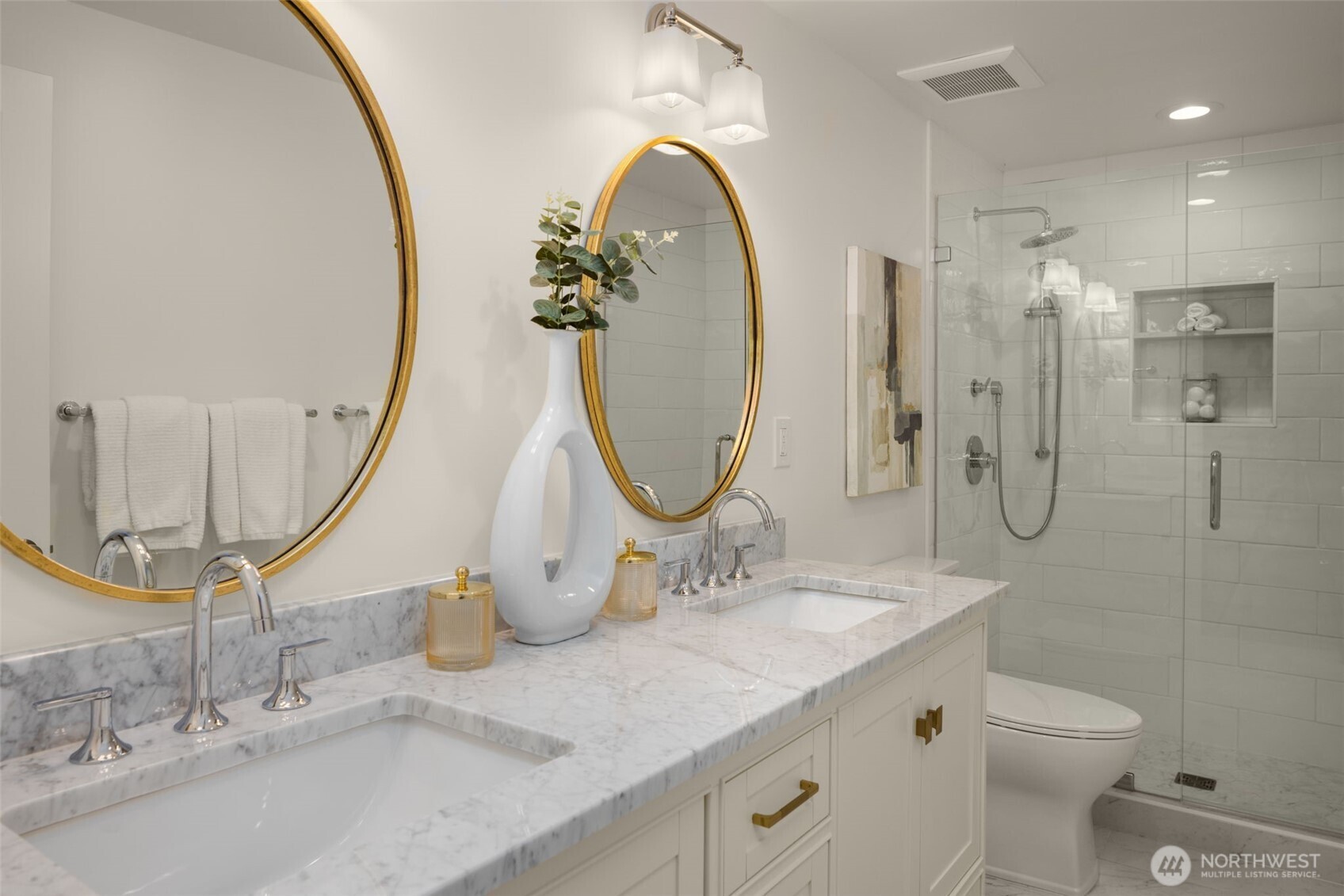 3204 Evergreen Point Road Medina, WA 98039 - Photo 25 of 39 a bathroom with a sink and mirror