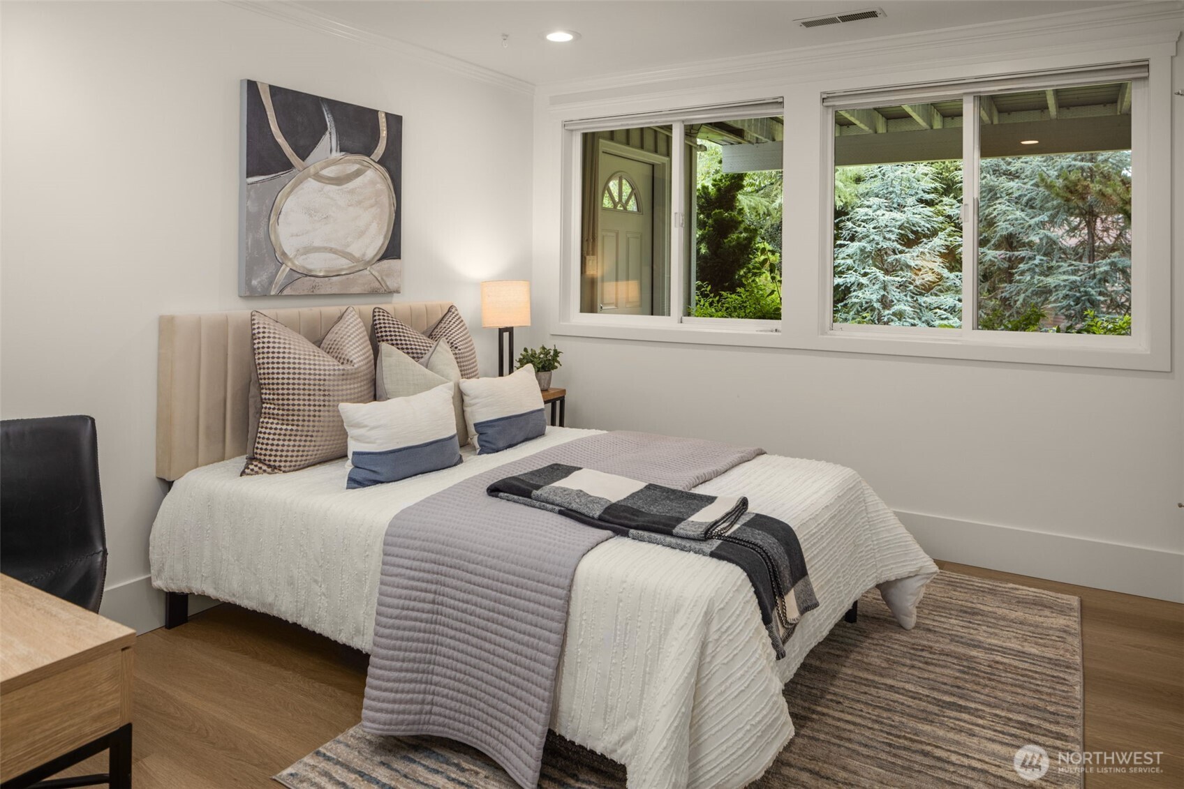 3204 Evergreen Point Road Medina, WA 98039 - Photo 28 of 39 a bedroom with bed and a large window