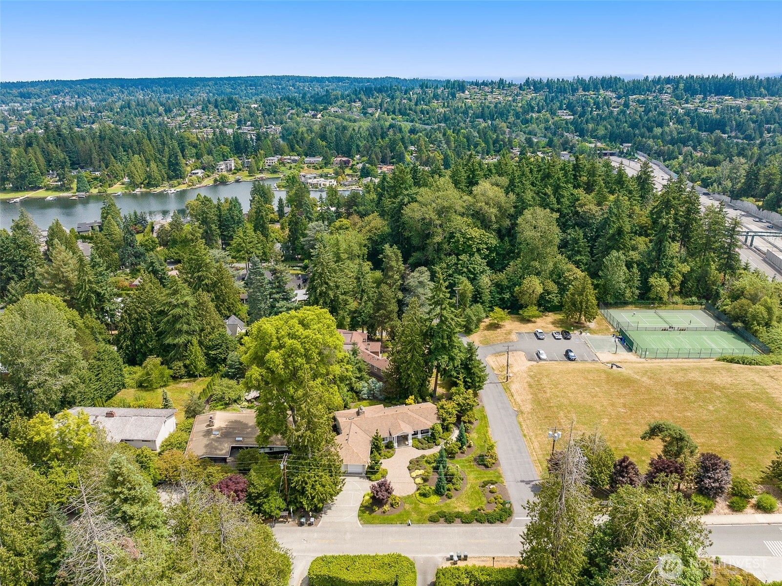 3204 Evergreen Point Road Medina, WA 98039 - Photo 38 of 39 a view of a lake with a city