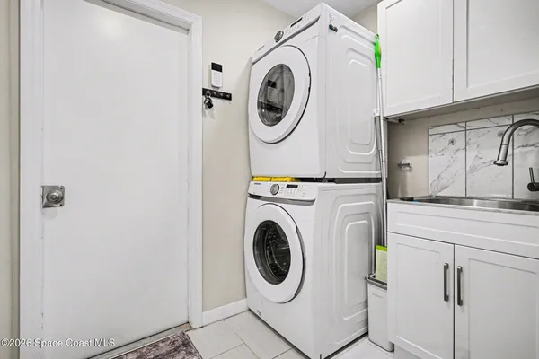 a utility room with dryer and washer