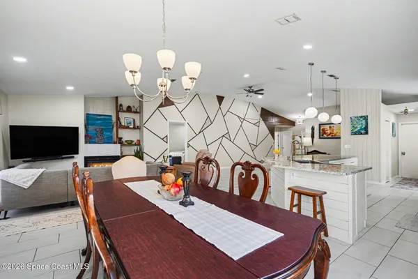 a view of a dining room with furniture