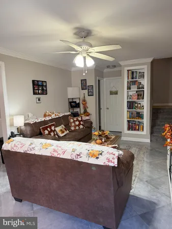 a living room with furniture and window