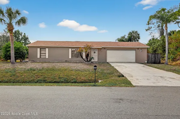 a house view with a outdoor space