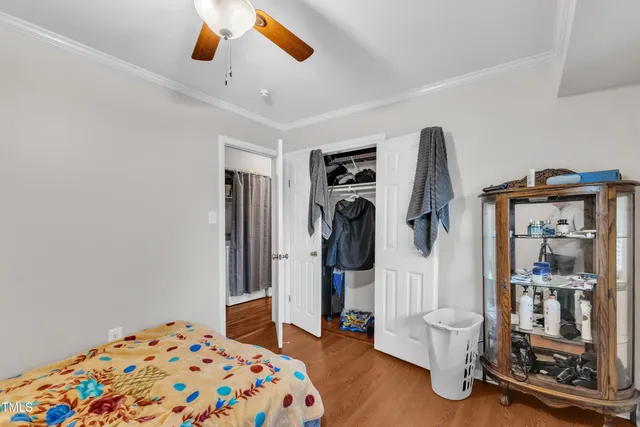 a bathroom with a sink mirror vanity and toilet