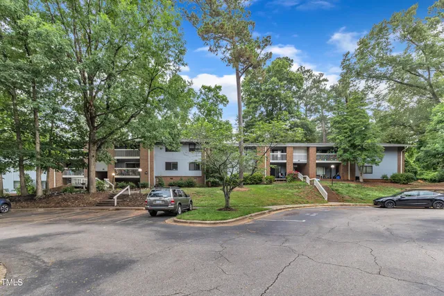 a car parked in front of a house