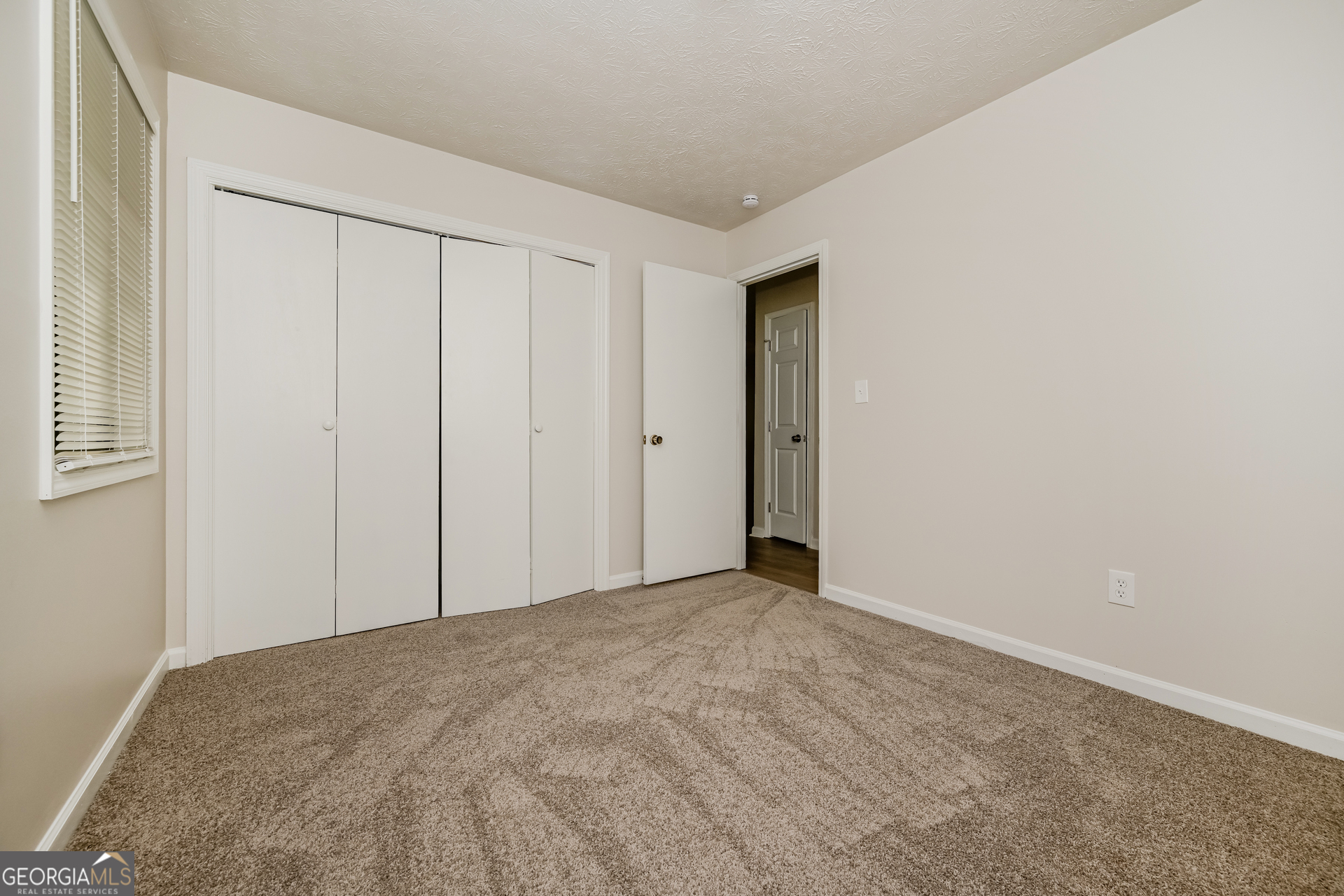 2140 Teri Lane Southeast Conyers, GA 30013 - Photo 11 of 16 a view of an empty room