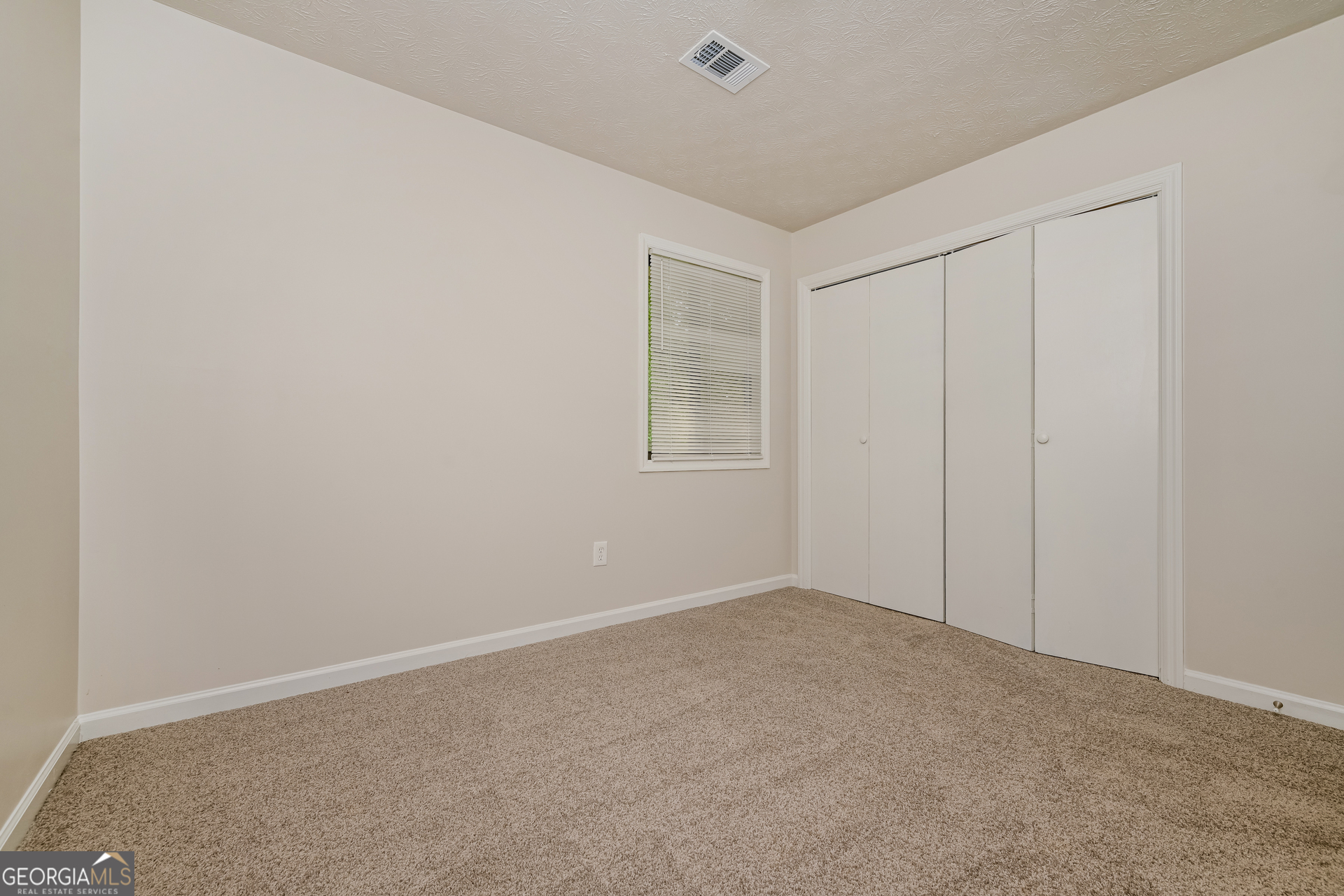 2140 Teri Lane Southeast Conyers, GA 30013 - Photo 10 of 16 a view of an empty room