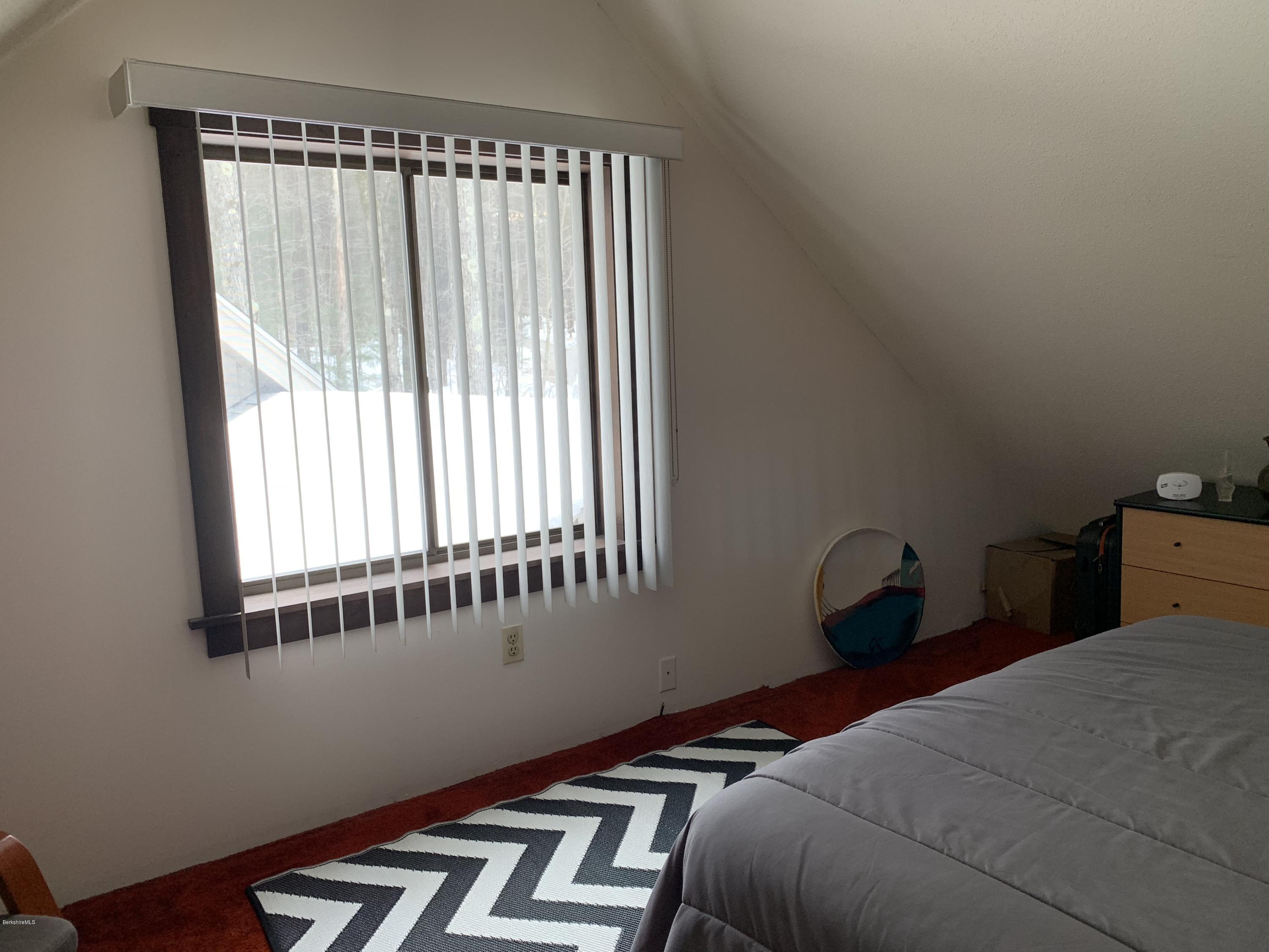29 Pinnacle Road Otis, MA 01253 - Photo 19 of 37 a bedroom with bed and window