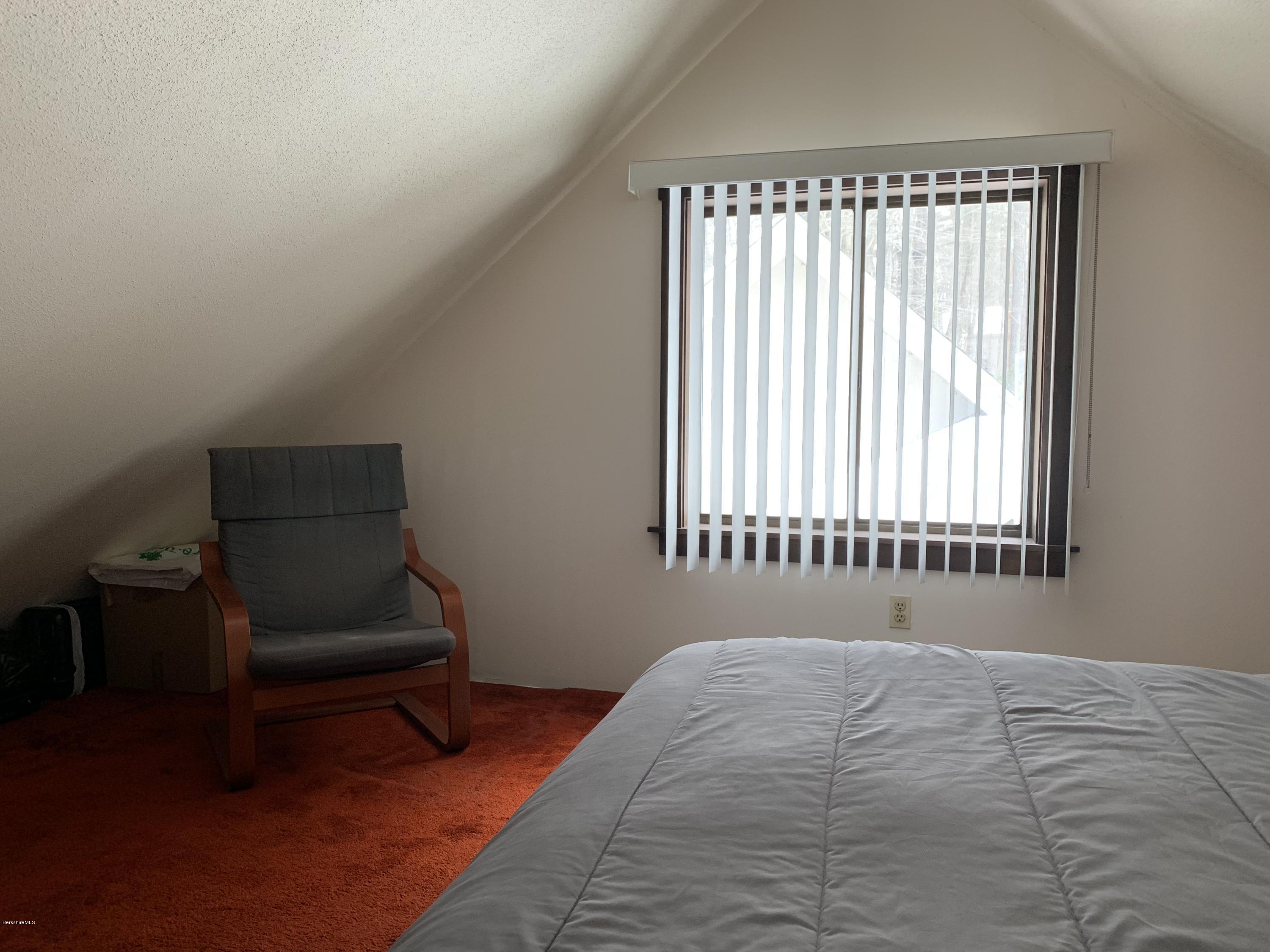 29 Pinnacle Road Otis, MA 01253 - Photo 20 of 37 a bedroom with a bed and a window