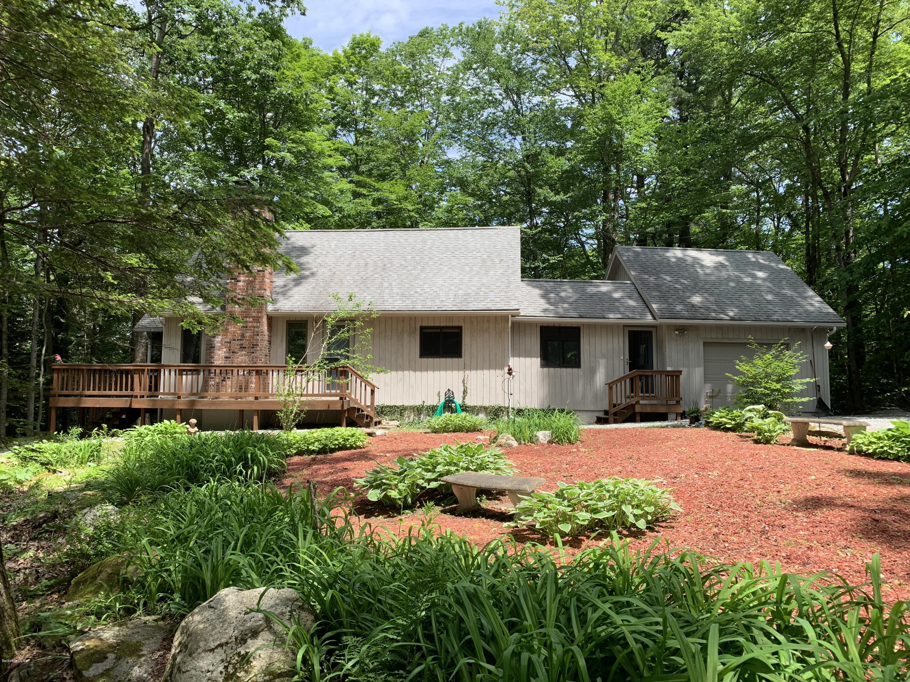 29 Pinnacle Road Otis, MA 01253 - Photo 3 of 37 a front view of a house with garden