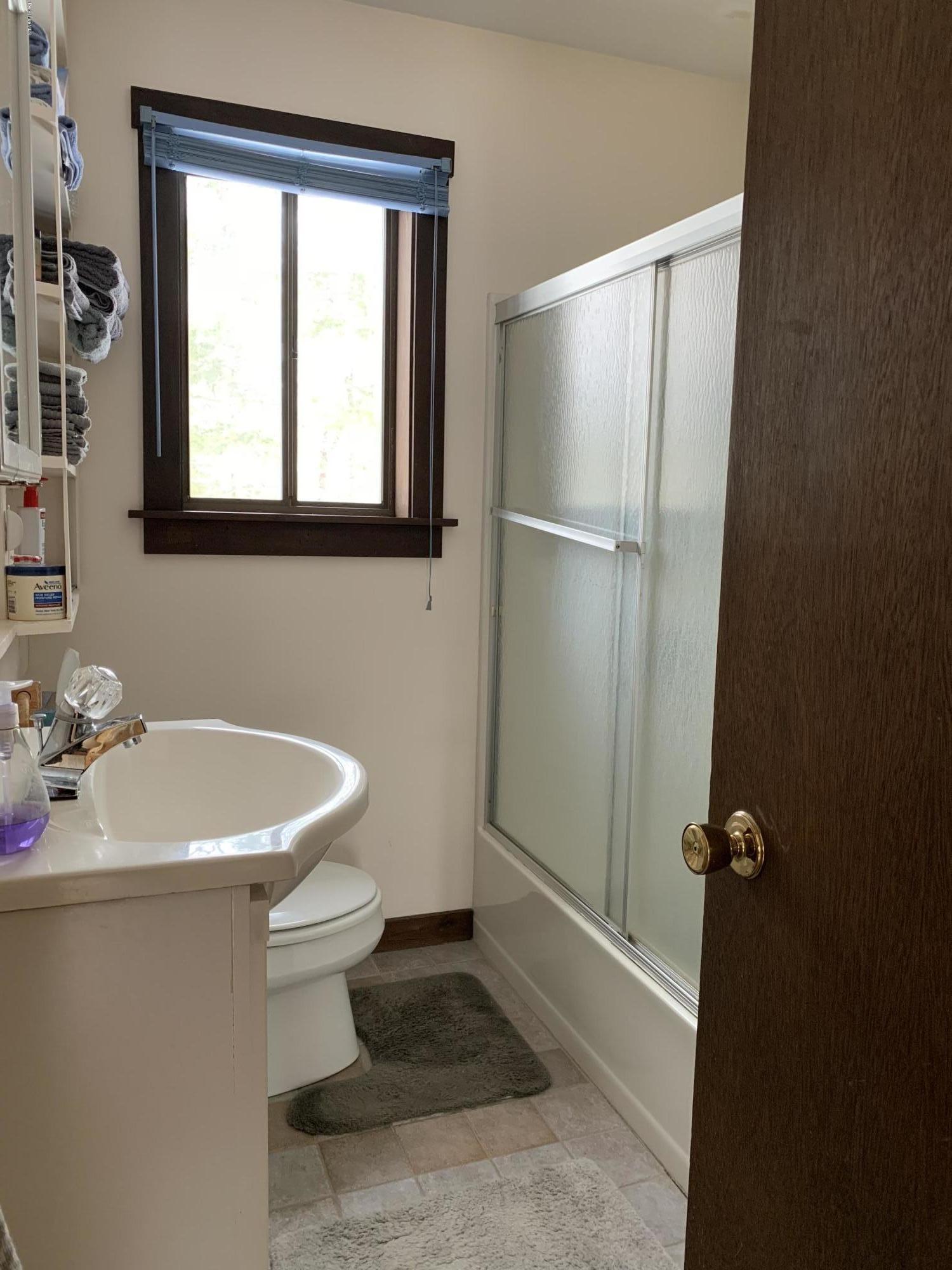 29 Pinnacle Road Otis, MA 01253 - Photo 22 of 37 a bathroom with a sink toilet and shower
