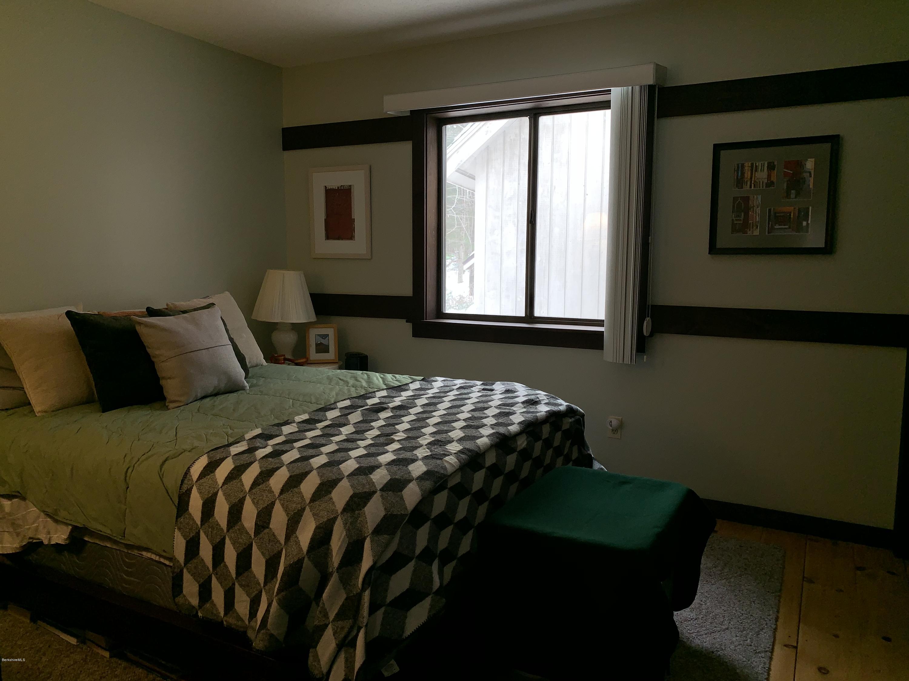 29 Pinnacle Road Otis, MA 01253 - Photo 23 of 37 a bedroom with a bed and a window