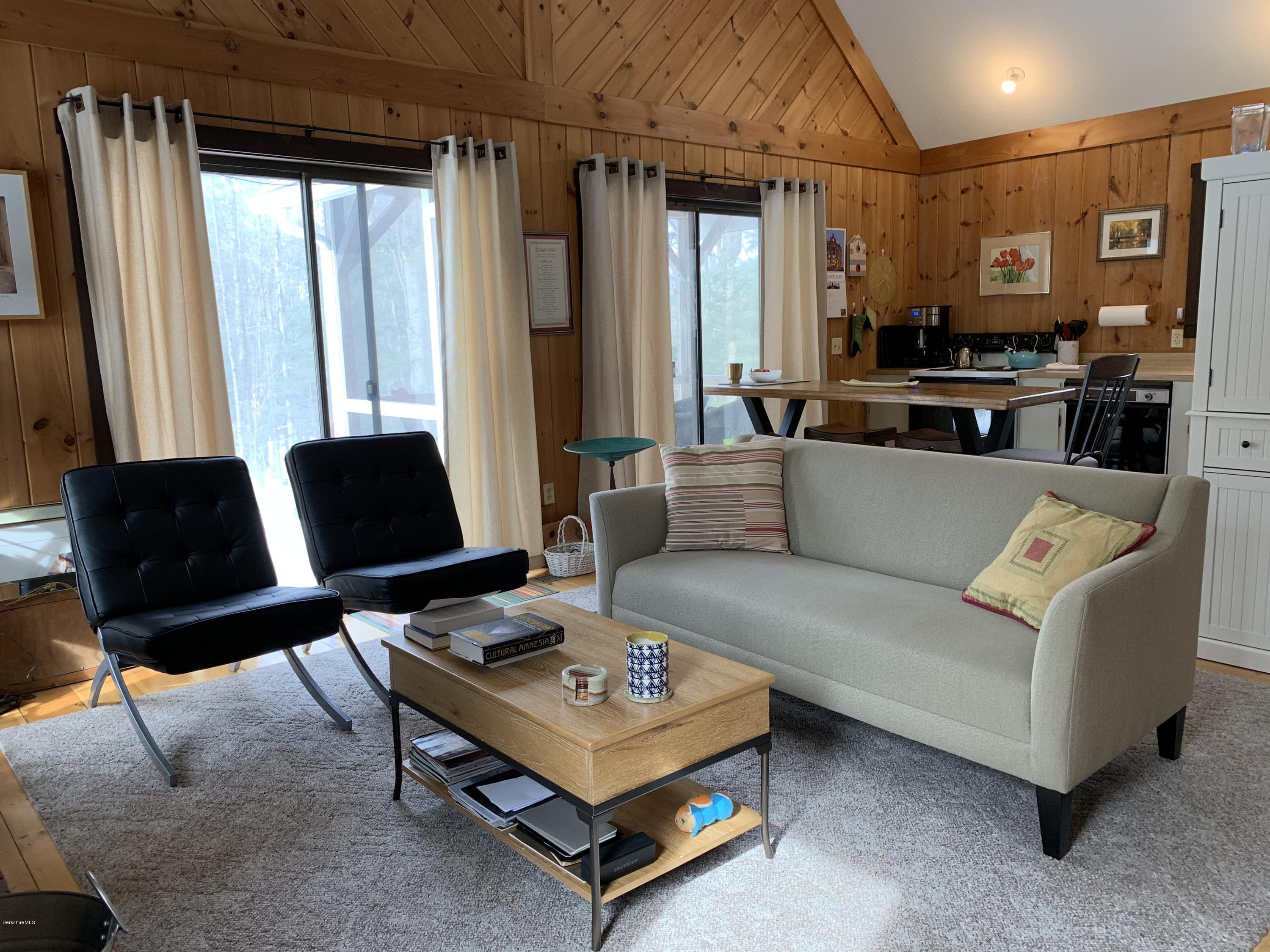 29 Pinnacle Road Otis, MA 01253 - Photo 4 of 37 a living room with furniture and a window