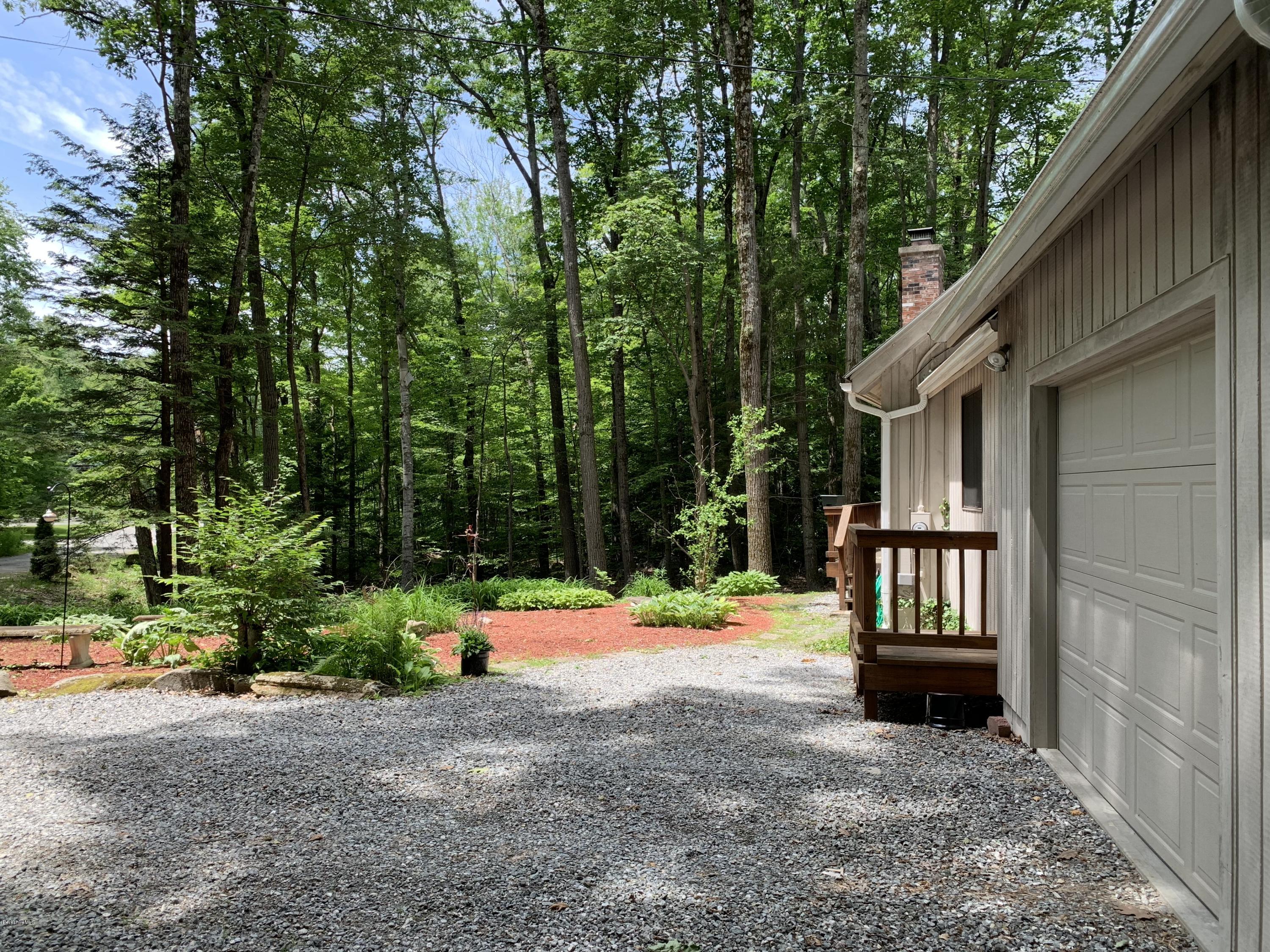 29 Pinnacle Road Otis, MA 01253 - Photo 35 of 37 a view of backyard with deck and garden