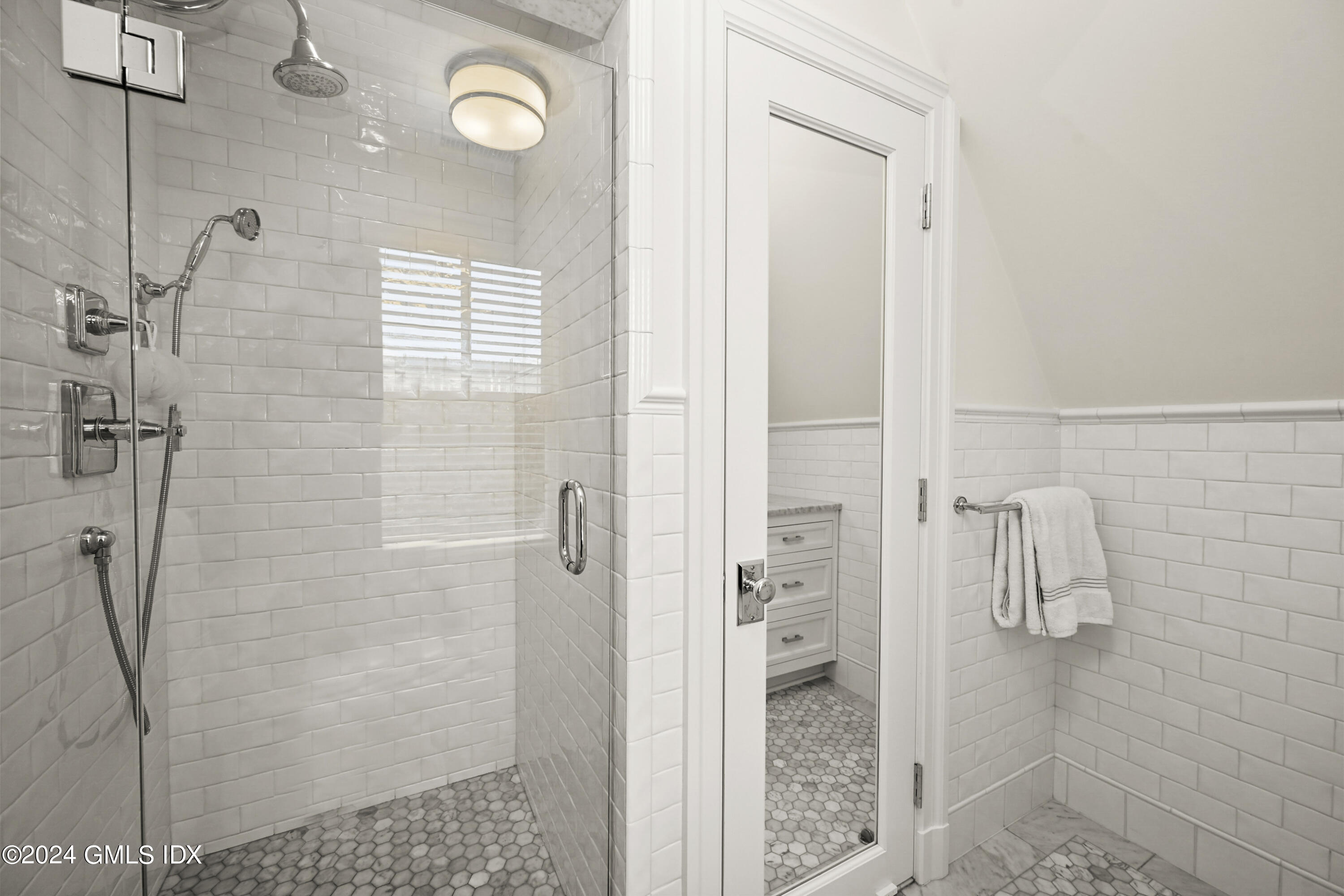 13 Grigg Street Greenwich, CT 06830 - Photo 12 of 30 a bathroom with a shower