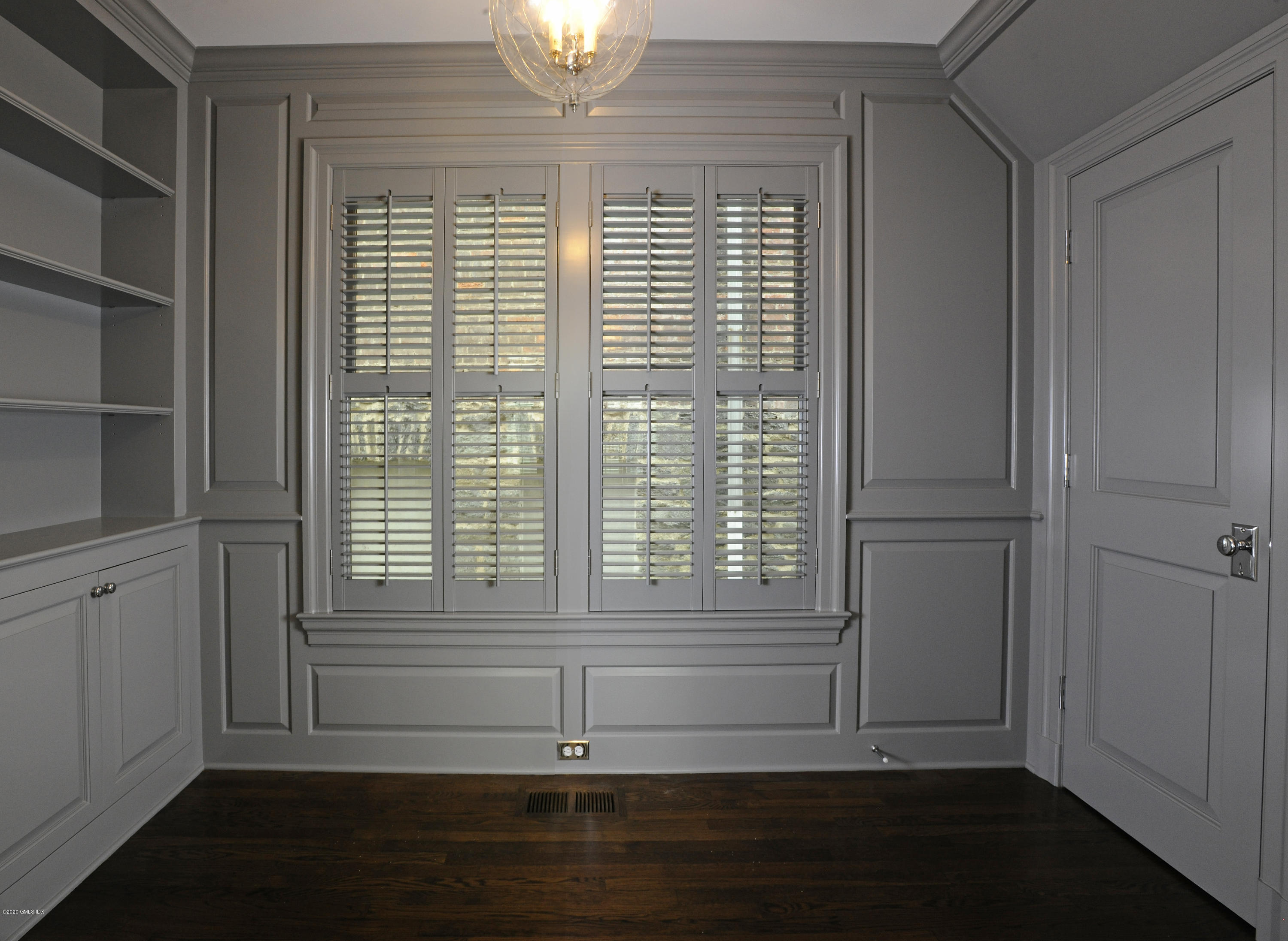 13 Grigg Street Greenwich, CT 06830 - Photo 23 of 30 a view of empty room with wooden floor and fan