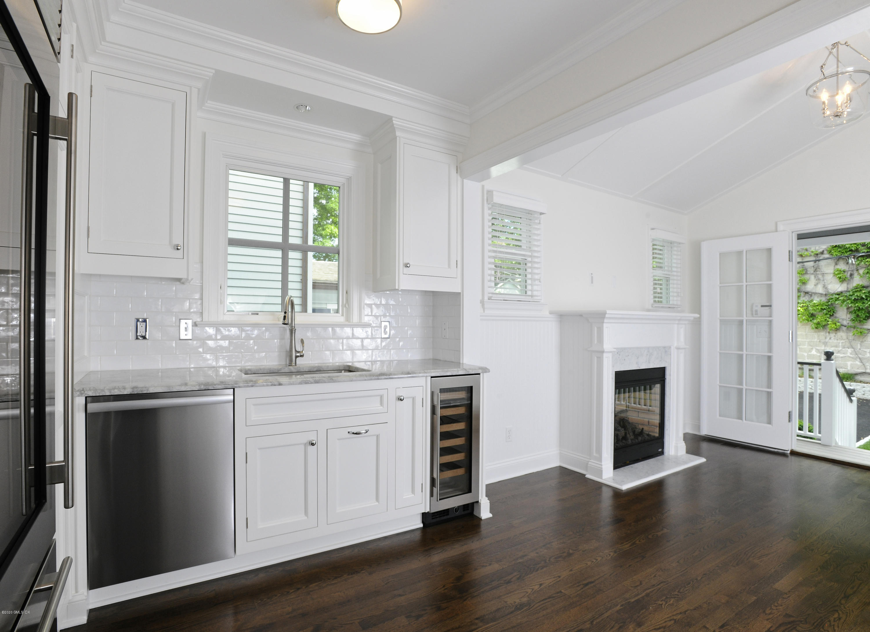 13 Grigg Street Greenwich, CT 06830 - Photo 24 of 30 a kitchen with sink cabinets and window
