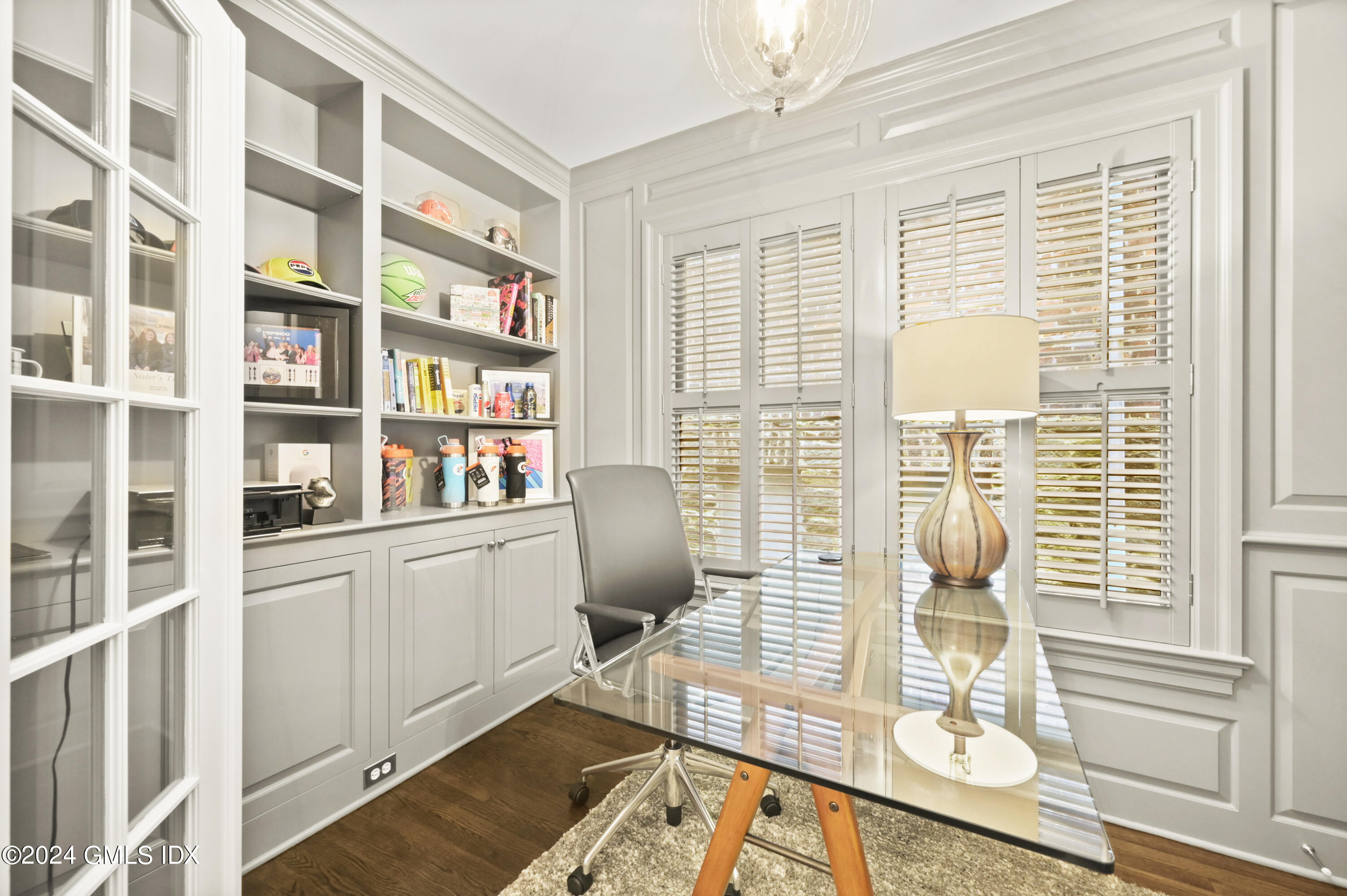 13 Grigg Street Greenwich, CT 06830 - Photo 4 of 30 a room with furniture and a window