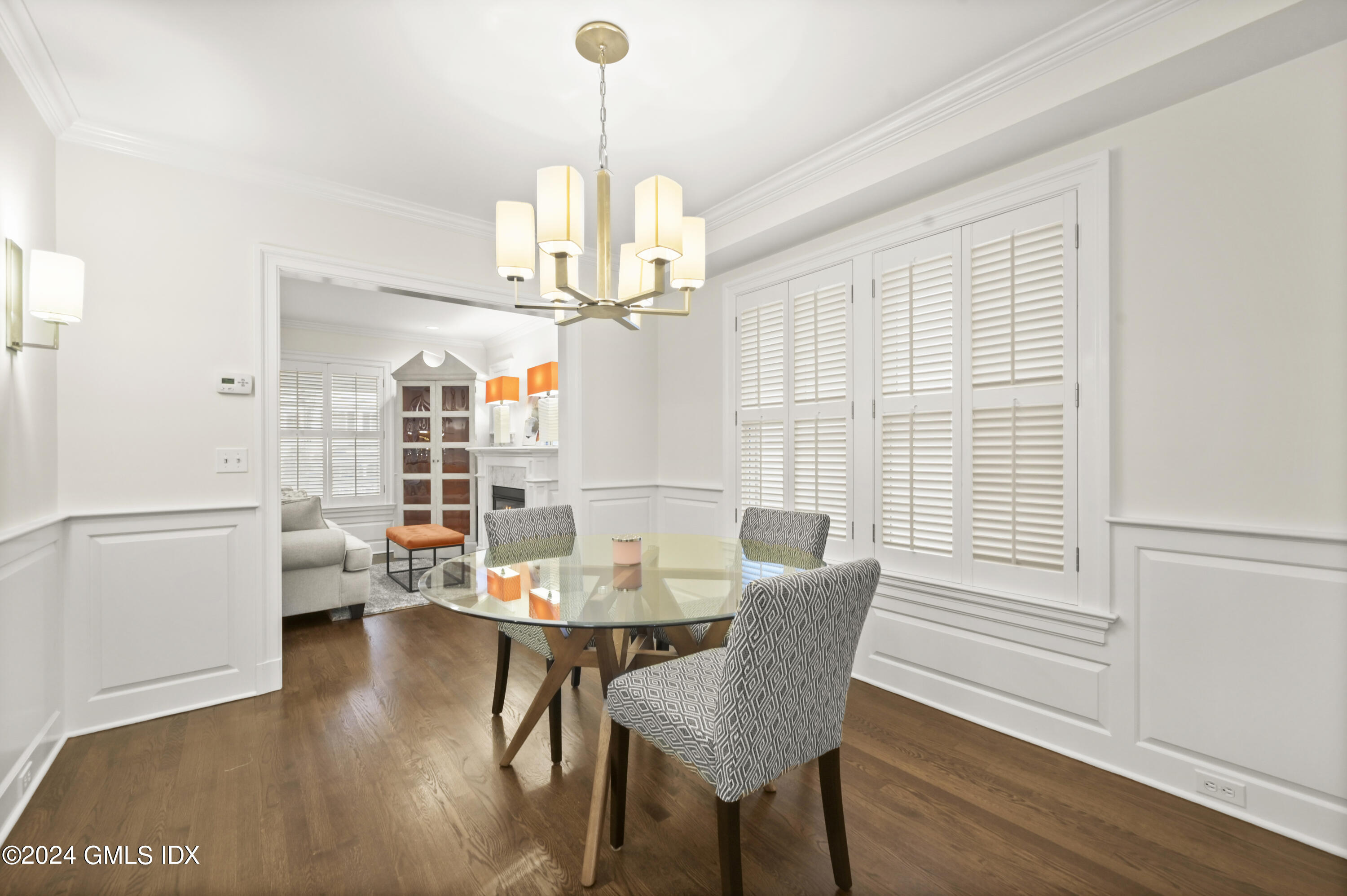 13 Grigg Street Greenwich, CT 06830 - Photo 5 of 30 a view of a dining room with furniture wooden floor and chandelier