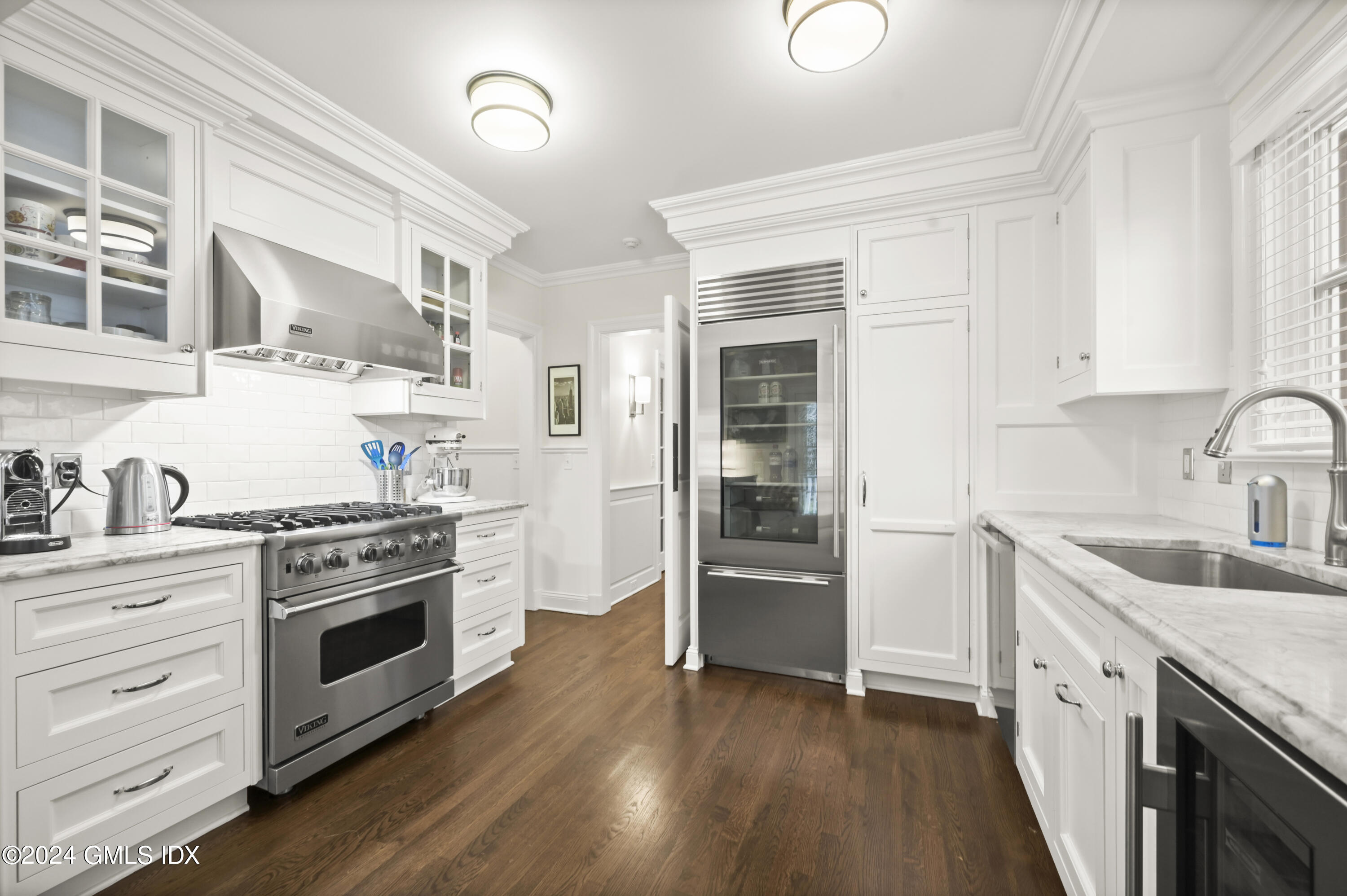13 Grigg Street Greenwich, CT 06830 - Photo 6 of 30 a kitchen with granite countertop a stove oven and sink