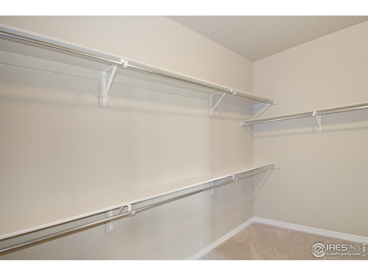 2045 Reed Grass Way Colorado Springs, CO 80915 - Photo 18 of 33 a view of a room with racks on the wall