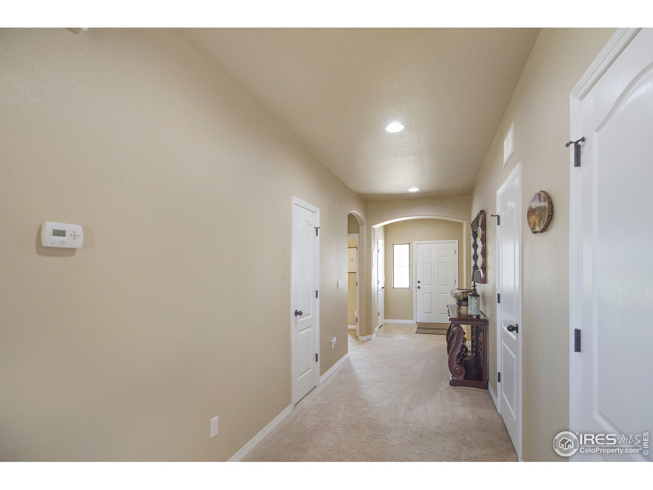 2045 Reed Grass Way Colorado Springs, CO 80915 - Photo 20 of 33 a bathroom with a sink and mirror