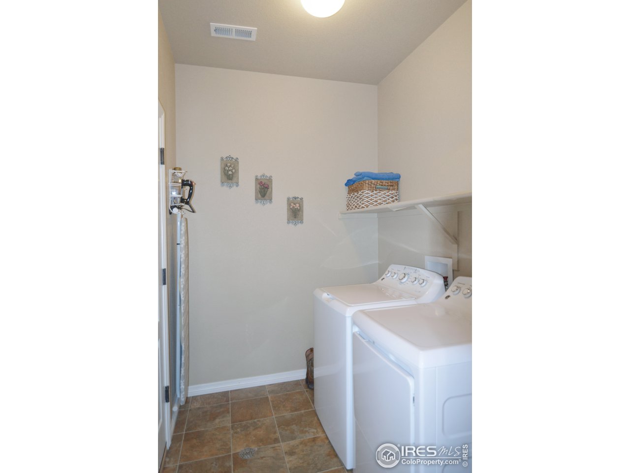 2045 Reed Grass Way Colorado Springs, CO 80915 - Photo 25 of 33 a bathroom with a sink and a toilet