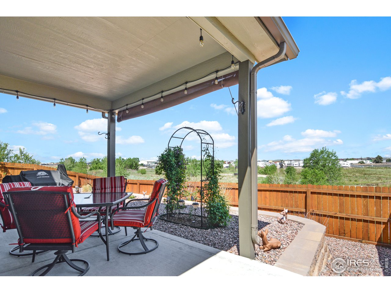 2045 Reed Grass Way Colorado Springs, CO 80915 - Photo 29 of 33 a view of a chairs and table in the patio