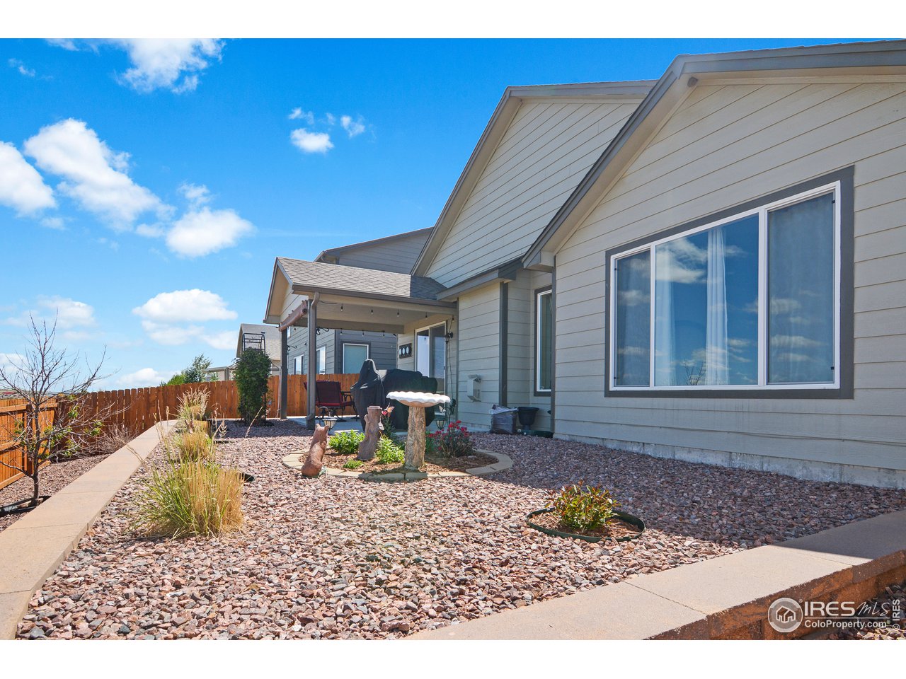 2045 Reed Grass Way Colorado Springs, CO 80915 - Photo 31 of 33 a view of a house with a patio