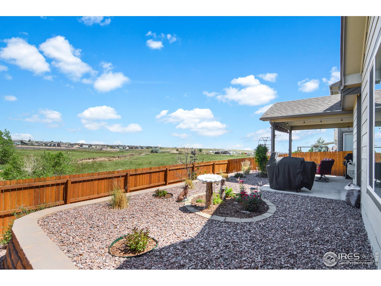 2045 Reed Grass Way Colorado Springs, CO 80915 - Photo 32 of 33 a view of a terrace with furniture
