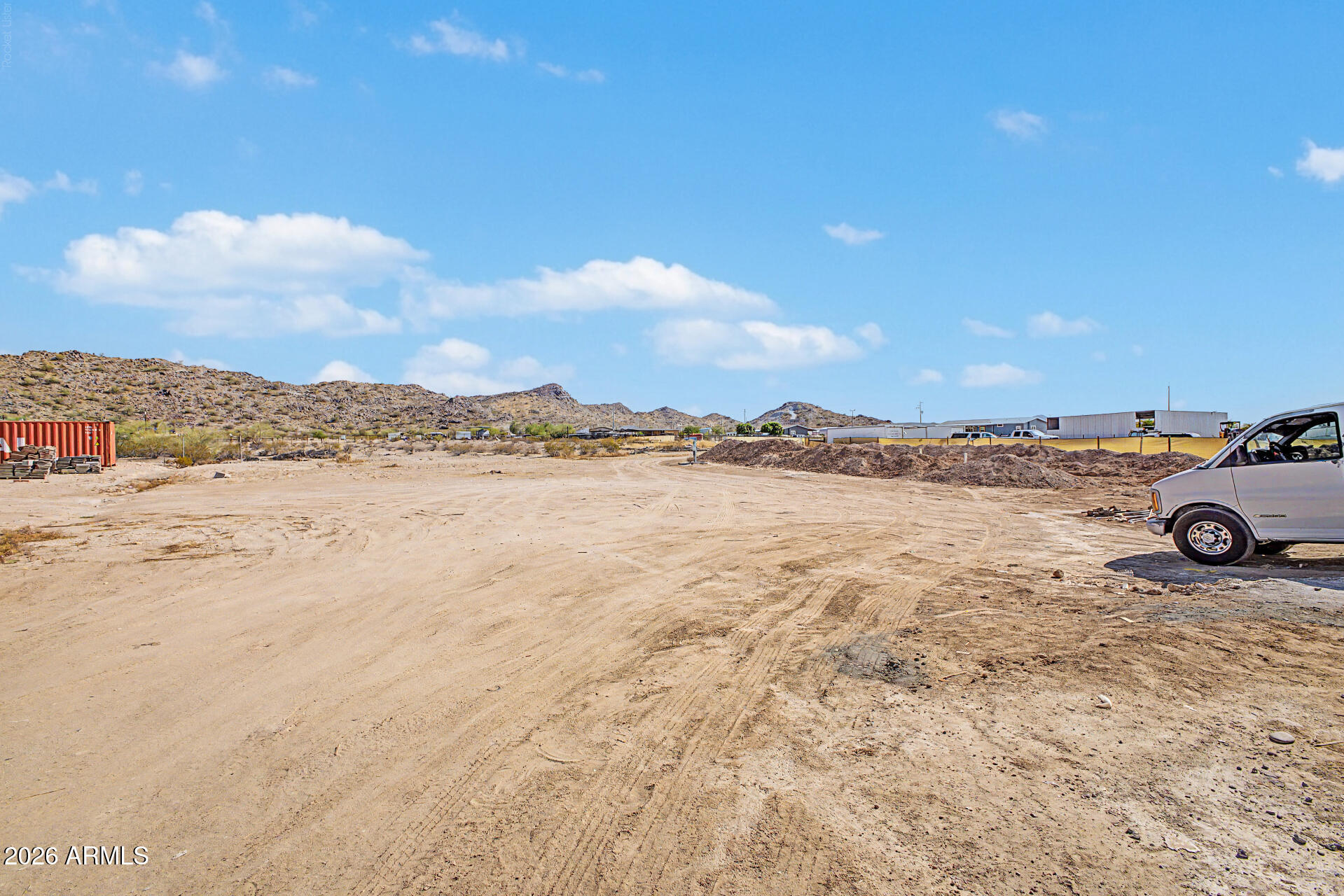 18815 West Arlington Road Buckeye, AZ 85326 - Photo 55 of 56 a view of a lake with a mountain