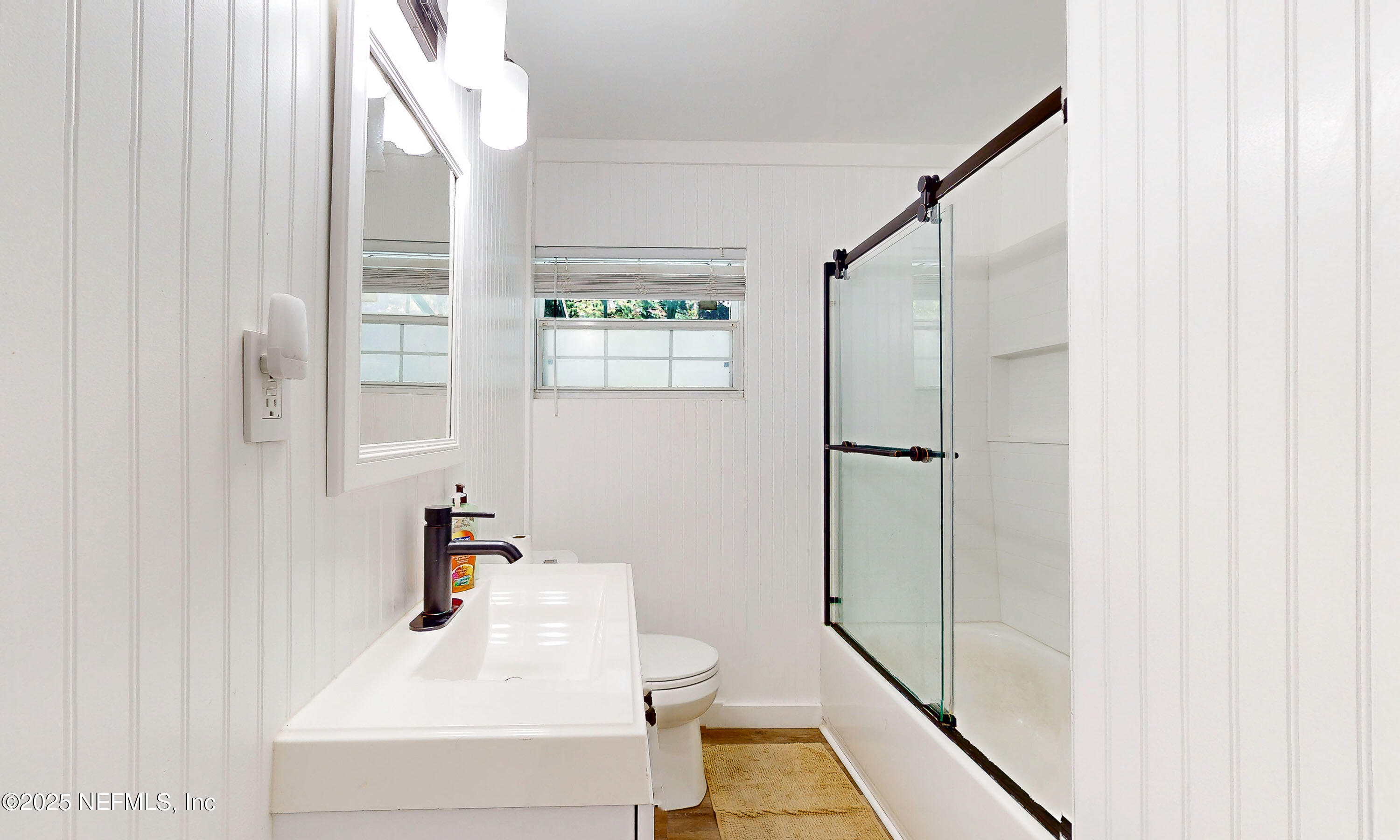 90 Forest Street Keystone Heights, FL 32656 - Photo 19 of 42 a bathroom with a sink and a shower