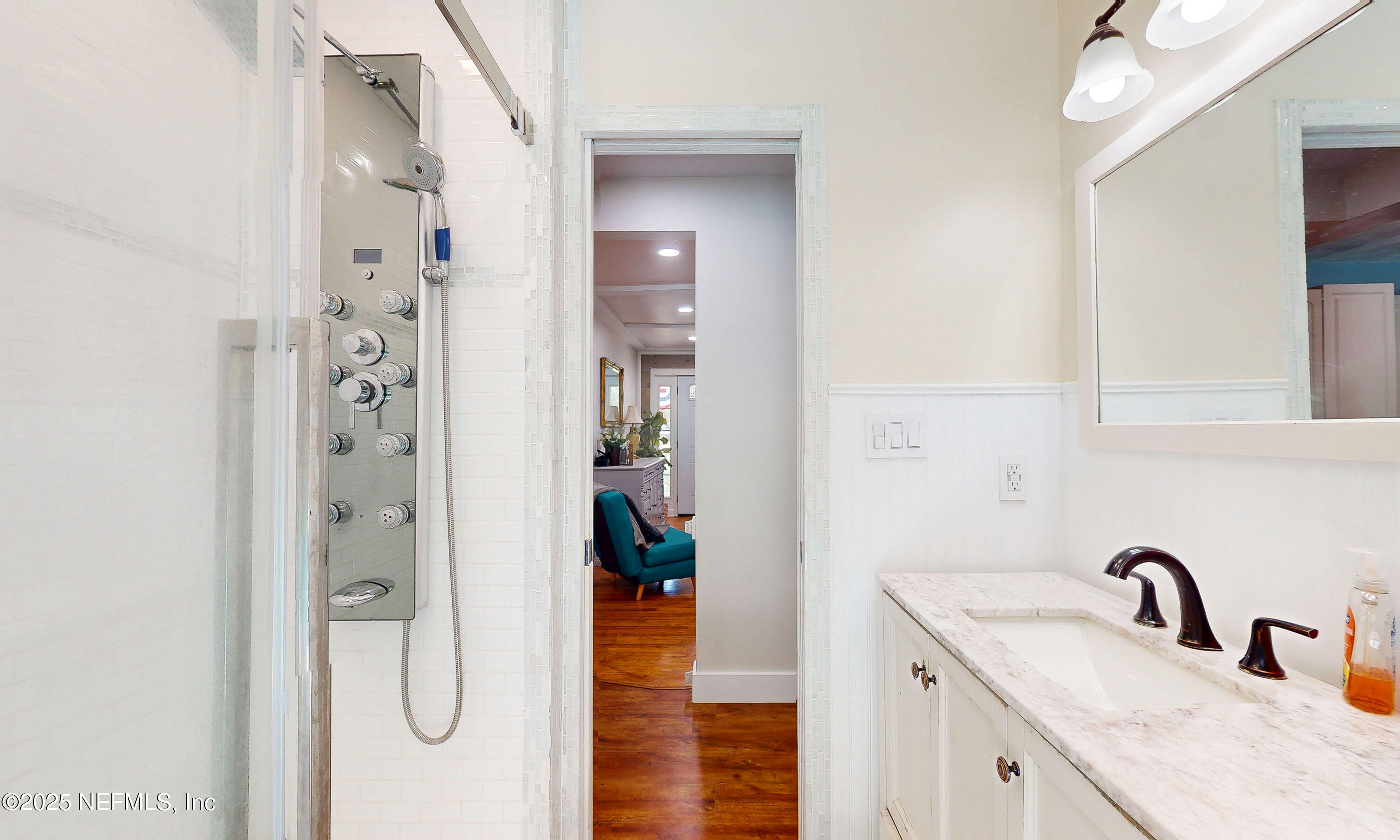 90 Forest Street Keystone Heights, FL 32656 - Photo 21 of 42 a bathroom with a shower sink and mirror