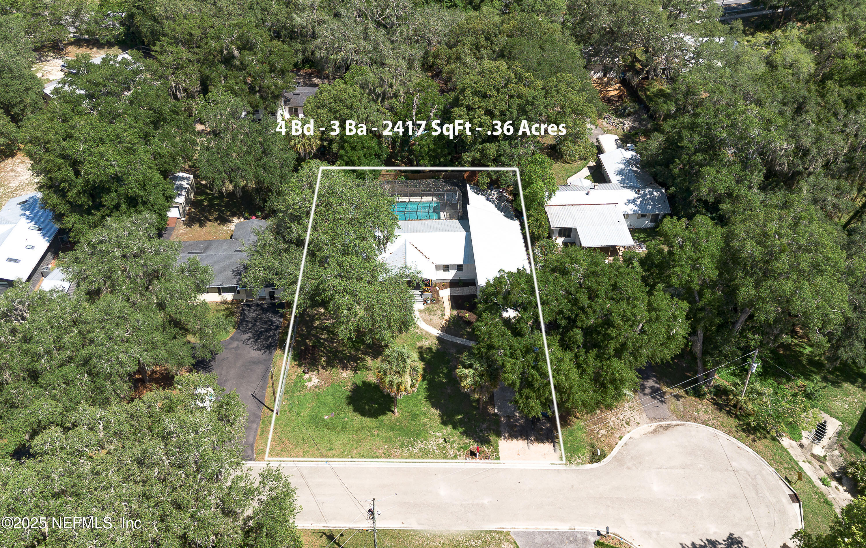 90 Forest Street Keystone Heights, FL 32656 - Photo 39 of 42 an aerial view of a house with a yard