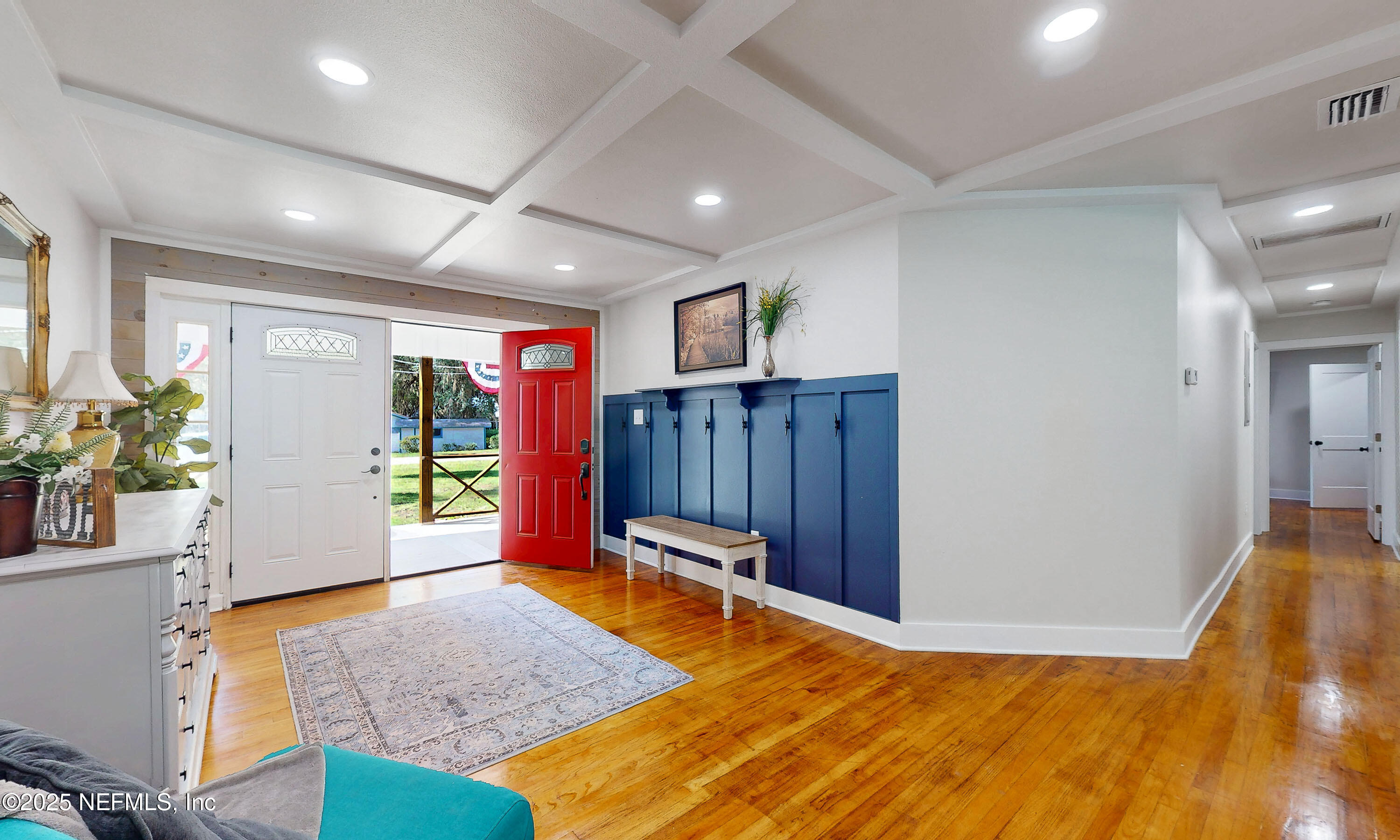 90 Forest Street Keystone Heights, FL 32656 - Photo 8 of 42 a view of a room with furniture and wooden floor