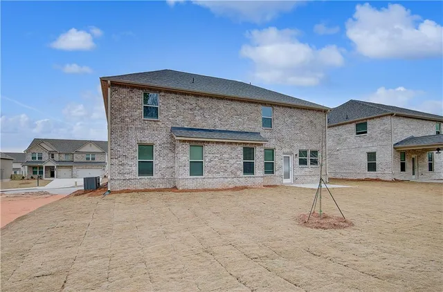 a front view of a house with a patio